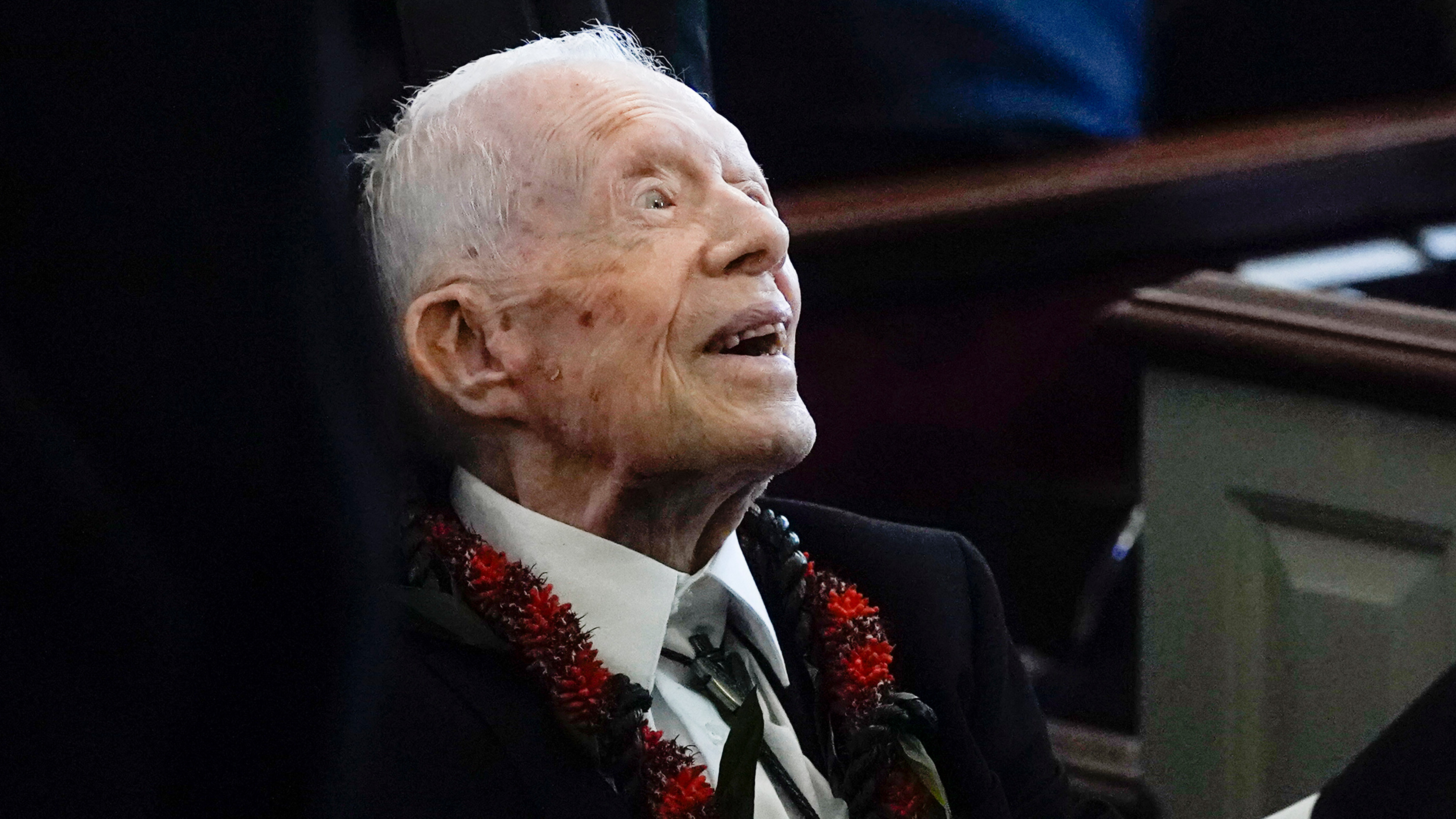 Former President Jimmy Carter greets attendees as he departs the funeral service for his wife, former first lady Rosalynn Carter, at Maranatha Baptist Church in Plains, Ga., Nov. 29, 2023.