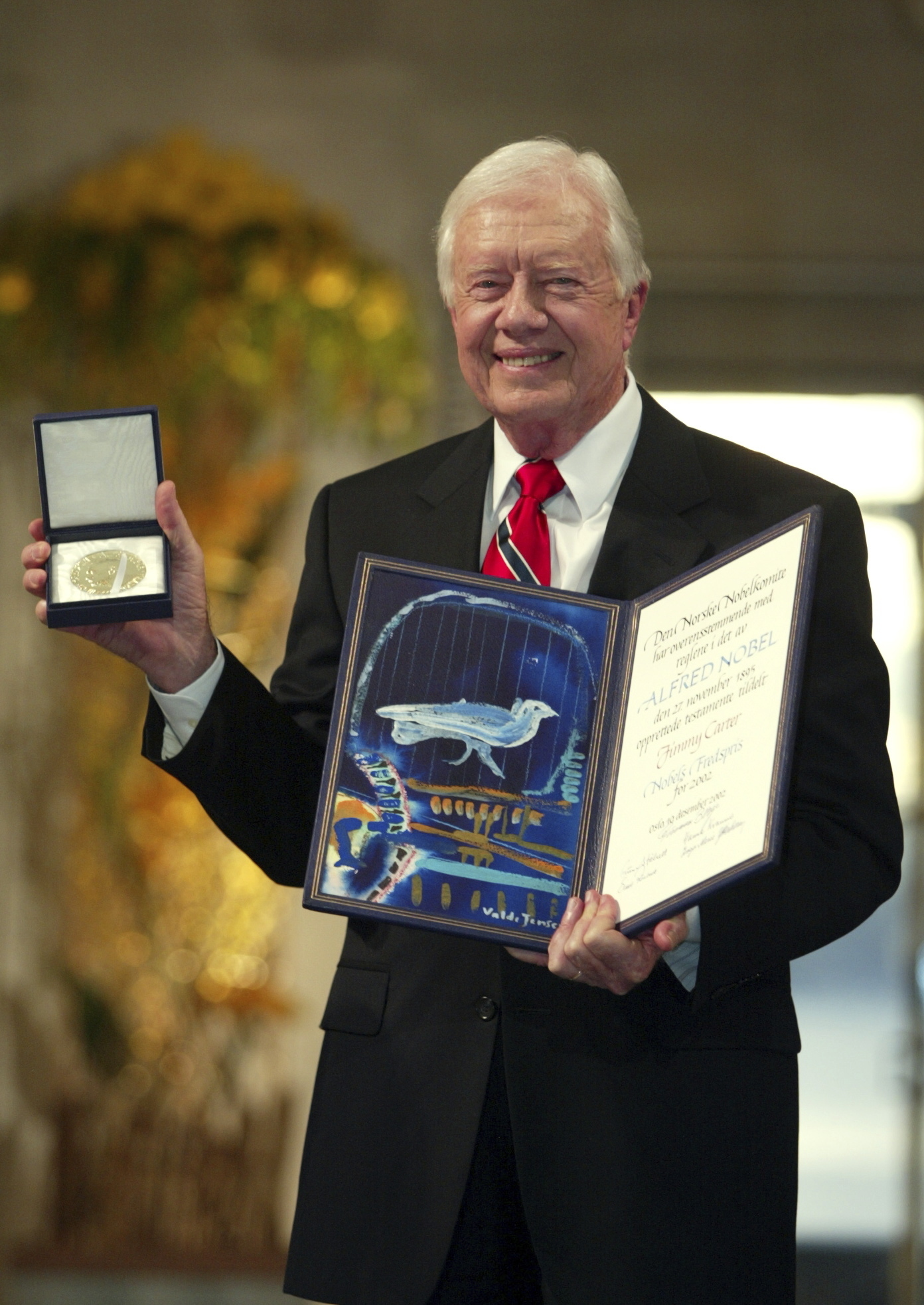 Former President Jimmy Carter receives the 2002 Nobel Peace Prize in Oslo City Hall in Oslo, Norway, Dec. 10, 2002. 