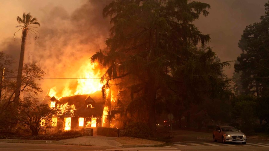 A house engulfed in flames